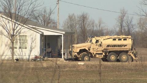 Special Response Team MRAP vehicle pulling into driveway