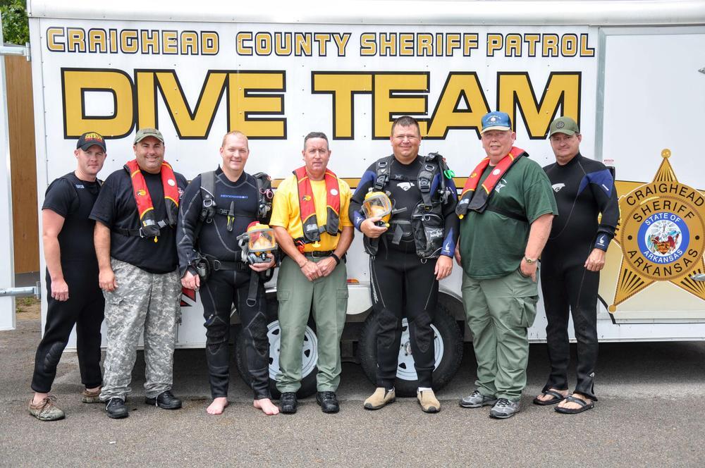 Craighead County Dive Team in Gear standing in  front of trailor