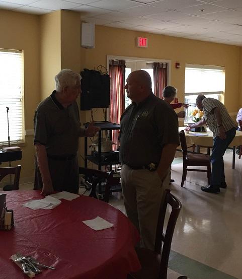 Sheriff Boyd listens to a citizen.JPG