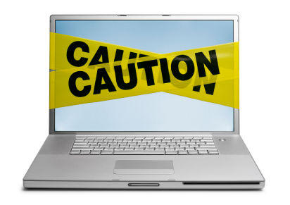 Caution taped laptop.jpg